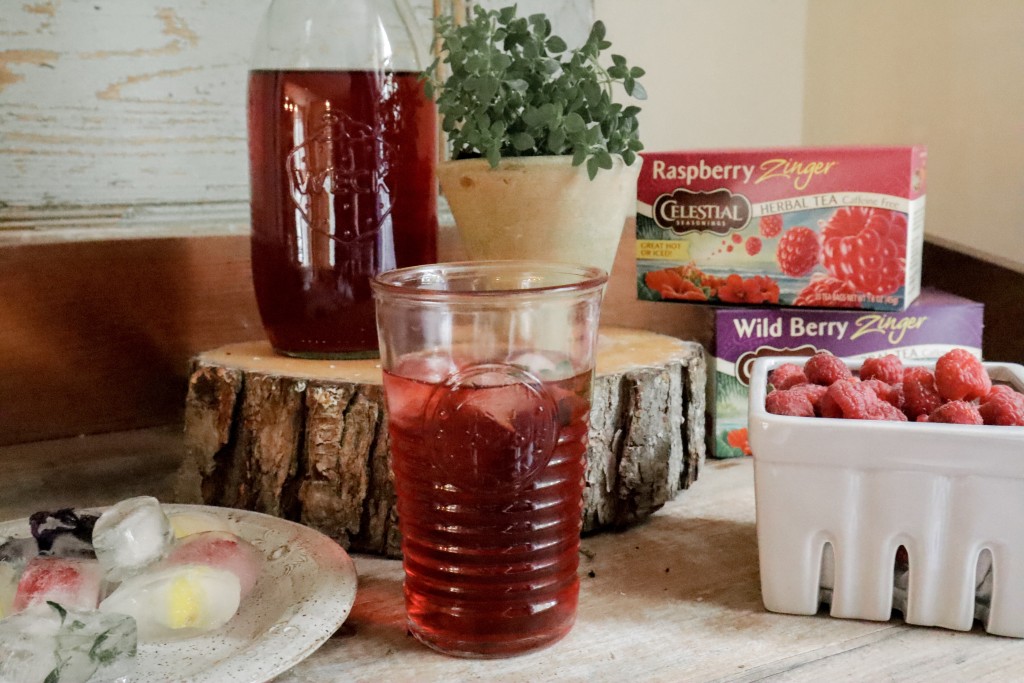 Raspberry Cold brew iced tea recipe with herb and fruit embellished ice cubes recipe summer beverage