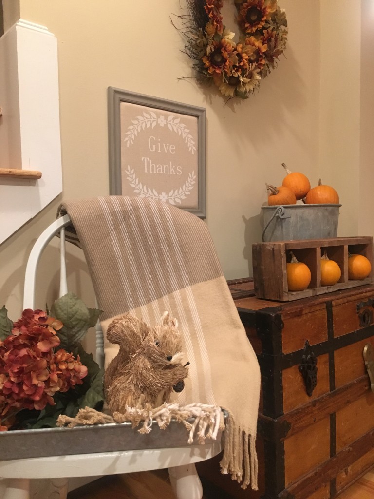 Flavors of Fall Home Tour Beige Neutral Farmhouse Style Fall Decor From the Family With Love squirrel, hydrangeas, give thanks, plaid afghan, pumpkins