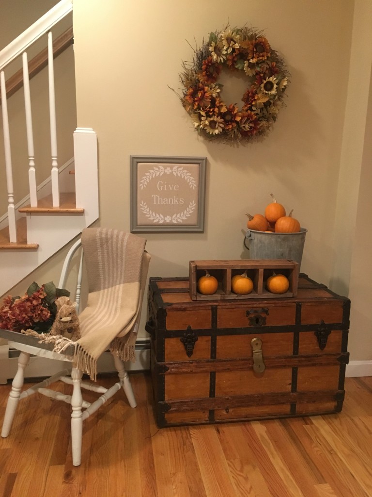 Flavors of Fall Home Tour Beige Neutral Farmhouse Style Fall Decor From the Family With Love squirrel, hydrangeas, give thanks, plaid afghan, pumpkins, white chair, vintage trunk