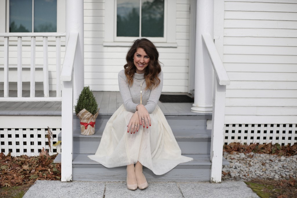 Holiday Midi Skirts - 9 Festive Favorites - Talbots Sabrina cashmere sweater, ivory tulle skirt, nude pumps, Clinique bamboo pink lipstick, Charming Charlie tassel necklace - From the Family With Love