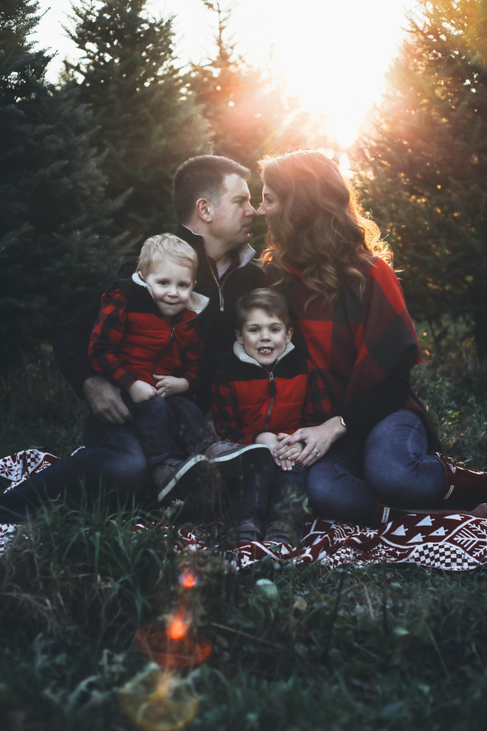 Merry Christmas family pictures 2017 - From the Family With Love - buffalo check family outfits, red Hunter boots, mistletoe, red mittens, tree farm, red vests, buffalo plaid scarf