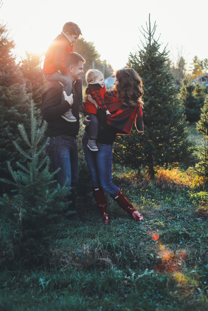 Merry Christmas family pictures 2017 - From the Family With Love - buffalo check family outfits, red Hunter boots, mistletoe, red mittens, tree farm, red vests, buffalo plaid scarf