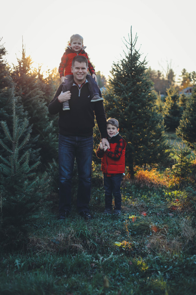 Merry Christmas family pictures 2017 - From the Family With Love - buffalo check family outfits, red Hunter boots, mistletoe, red mittens, tree farm, red vests, buffalo plaid scarf