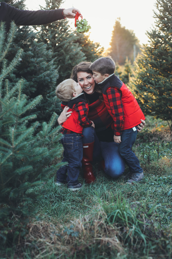 Merry Christmas family pictures 2017 - From the Family With Love - buffalo check family outfits, red Hunter boots, mistletoe, red mittens, tree farm, red vests, buffalo plaid scarf