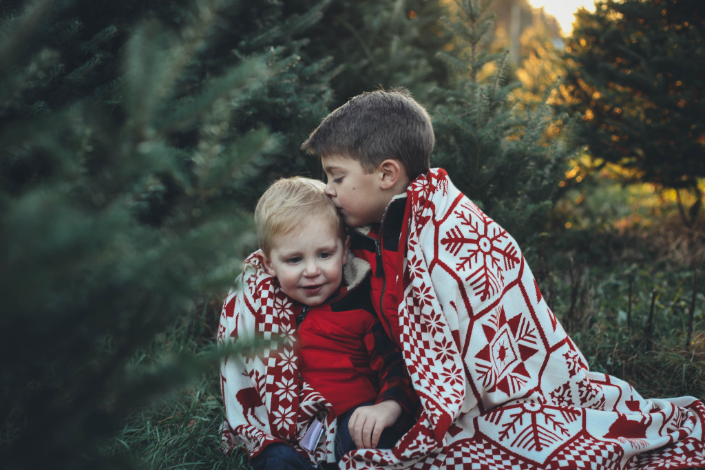 Merry Christmas family pictures 2017 - From the Family With Love - buffalo check family outfits, red Hunter boots, mistletoe, red mittens, tree farm, red vests, buffalo plaid scarf