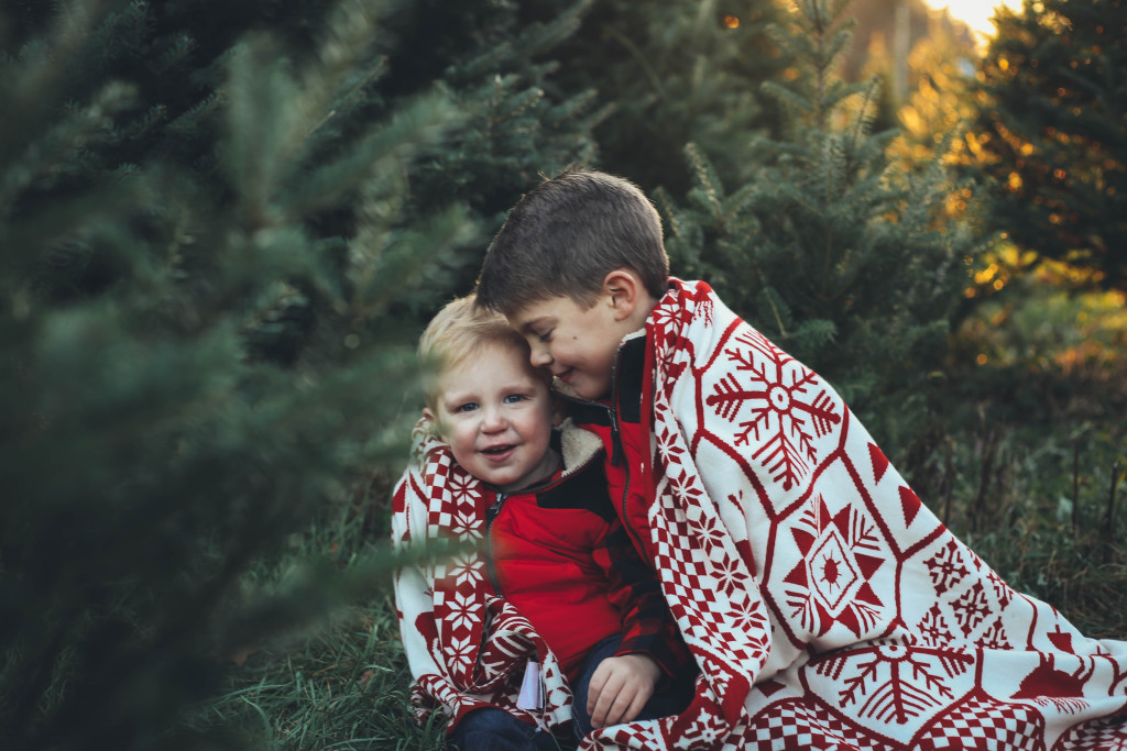 Merry Christmas family pictures 2017 - From the Family With Love - buffalo check family outfits, red Hunter boots, mistletoe, red mittens, tree farm, red vests, buffalo plaid scarf