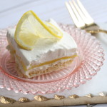Layered Lemon Delights recipe with My Hannaford Rewards - shortbread cookie crust, whipped cream cheese layer, lemon pie filling layer all topped with homemade whipped cream - From the Family