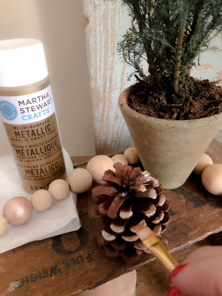 DIY Festive Painted Wood Bead Strand - Potting Table Farmhouse Christmas decor - Christmas Potting Table - Martha Stewart Metallic Rose Gold Paint, Martha Stewart glitter paint, Martha Stewart Gold Paint