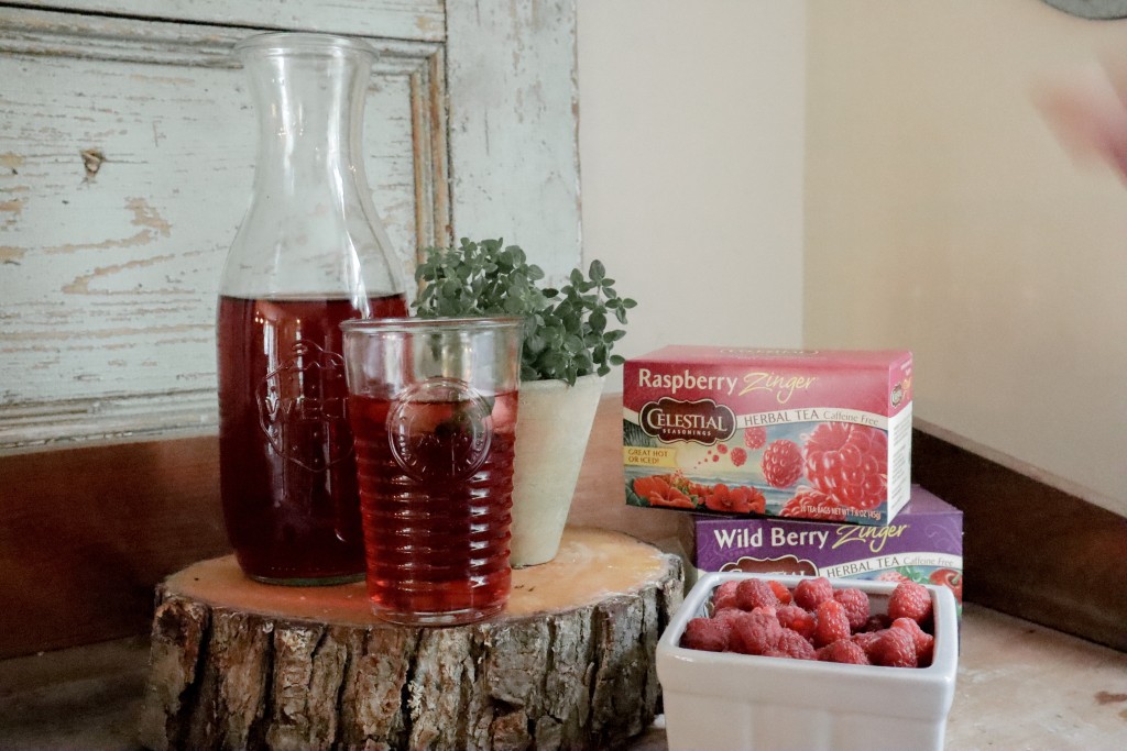 Raspberry Cold brew iced tea recipe with herb and fruit embellished ice cubes recipe summer beverage
